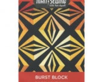 Man Sewing Burst Block Quilt Pattern by Rob Appell for MSQC