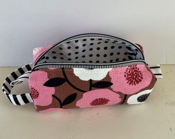 Handmade pink floral boxy bag. This retro bloom dopp kit is the is the mid sized of 3 toiletry/make-up bags in the retro bloom collection.