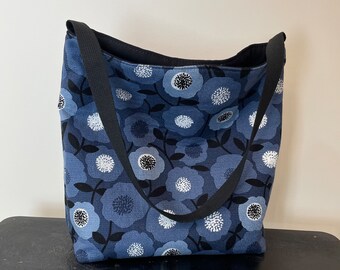 Handmade tote in Retro Bloom blue floral for work,  school,  or shopping.  Shoulder strap and magnetic snap closure. One of a kind.