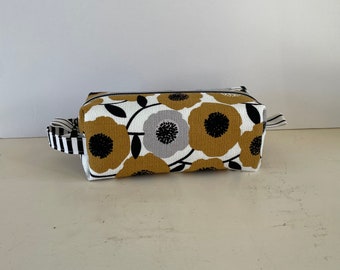 Handmade gold floral boxy bag. This retro bloom dopp kit is the largest of 3 toiletry/make-up bags in the retro bloom collection.