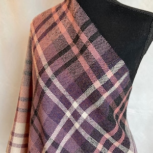 Plum plaid. Blanket scarf in purples, pink, black, and white.