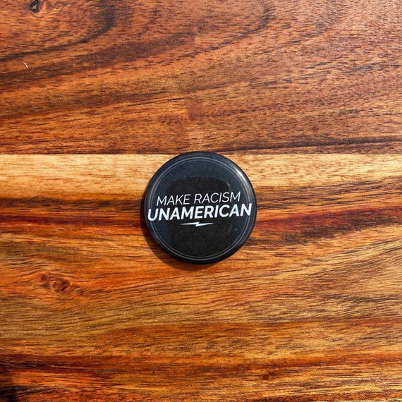Make Racism Un-American 1.5" Round Pin Back Button | Anti Racist Pin | End Racism Pin | Not My President | Anti-Fascist | Equity-Inclusion