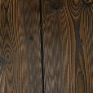 May include: Three close-up images of wood grain. The first image shows a light brown wood with white paint, the second image shows a dark brown wood, and the third image shows a white wood with dark brown grain.