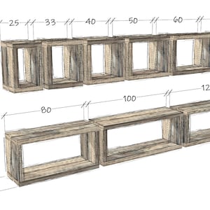 May include: A set of wooden shelves with a rustic finish. The shelves are made up of six individual boxes, with the top row of boxes measuring 25, 33, 40, 50, 60, and 75 inches wide. The bottom row of shelves measures 80, 100, and 120 inches wide. The shelves are labeled "H40" and "T28".