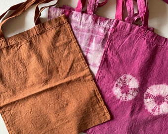 Cotton market bags hand dyed with cochineal (pink) and cutch (cinnamon)