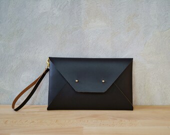 Dark brown leather clutch