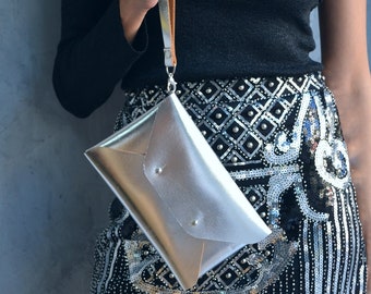 Silver leather clutch bag