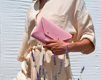 Hot pink leather clutch bag