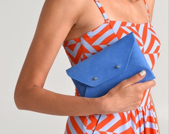 Blue leather clutch bag