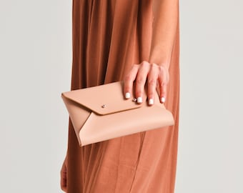 Nude leather clutch bag