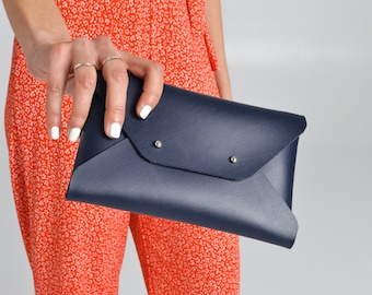 Navy blue leather clutch bag