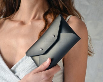 Black leather mini clutch