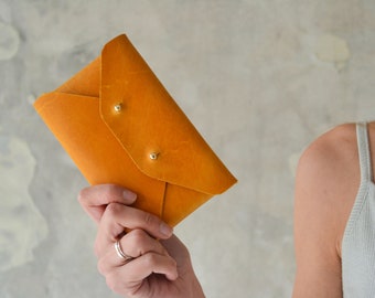 Ochre leather mini clutch