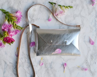 Silver leather clutch bag