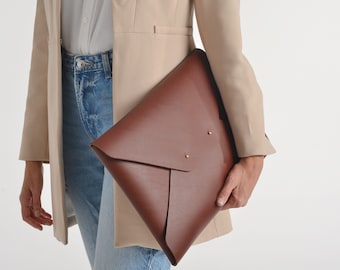 Brown leather clutch