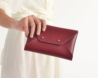 Bordeaux leather clutch bag