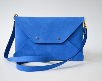 Blue leather clutch bag