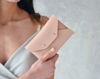 Nude leather mini clutch