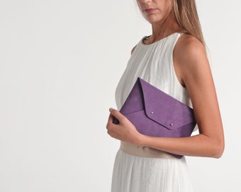 Dark purple leather clutch bag