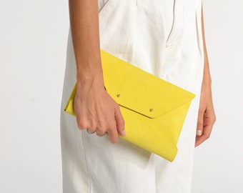 Lemon yellow leather clutch bag