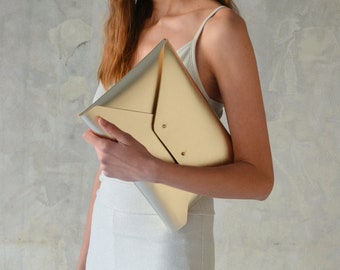 Gold leather clutch bag