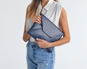 Navy blue leather clutch bag