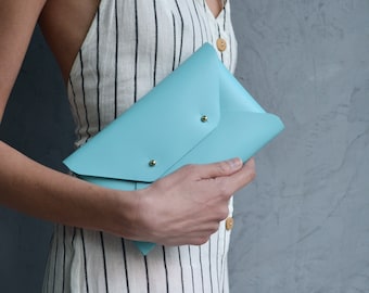 Turquoise leather clutch bag