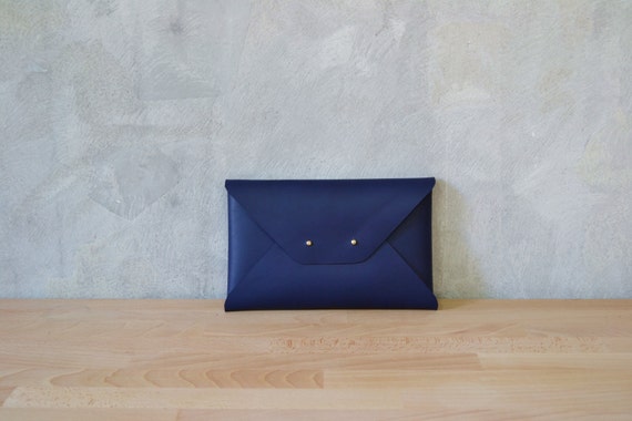 navy leather clutch bag