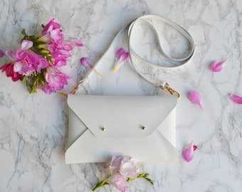 White leather clutch bag