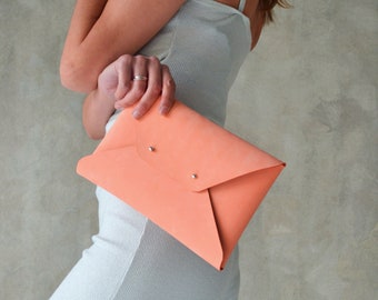 Peach leather clutch bag