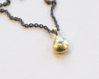 Gold piece with diamond star