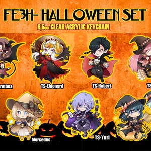 May include: Set of 8 Halloween-themed acrylic keychains featuring characters from the Fire Emblem: Three Houses video game. The keychains are 6.5 cm in diameter and feature characters like Dorothea, Edelgard, Hubert, Hilda, Mercedes, Yuri, and Byleth in various Halloween costumes.