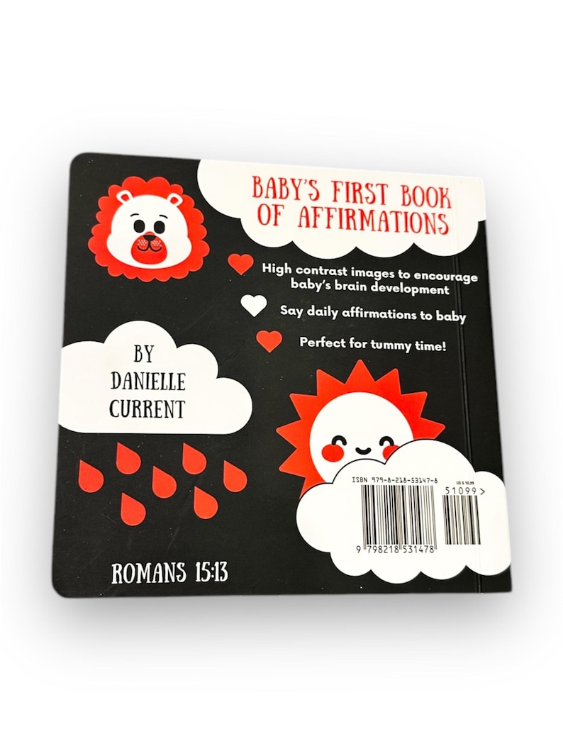 May include: A black and white book cover with a red lion illustration. The title is "Baby's First Book of Affirmations". The book is designed to encourage baby's brain development with high contrast images and daily affirmations. The back cover also includes the text "Romans 15:13".