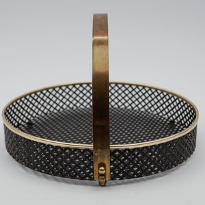 Small Mategot style perforated metal portable serving tray with brass handle, 1950s France