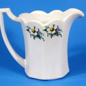 Pitcher by McCoy Pottery Lancaster Colony White Blue Floral USA 5.75&quot;