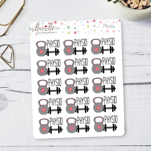 May include: A sheet of stickers featuring gray kettlebells and black barbells with the word "PHYSIO" in black. The stickers have a pink circle on the kettlebell. The sheet has the "Love Lee Ink" logo.