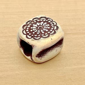 1 count 30mm vintage handmade tribal ivory and dark red ceramic cube bead with intricate motif story illustrations