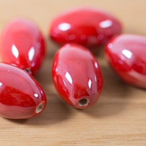 5 count 27mm high quality sanguine mauve cherry red porcelain ceramic beads oval shaped faceted glazed ceramic beads bead clay round