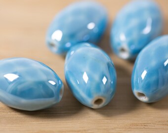 5 count 27mm high quality cyan sky blue glossy porcelain ceramic beads oval shaped faceted glazed ceramic beads bead clay round
