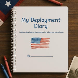 May include: A white spiral-bound notebook titled "My Deployment Diary" with the text "Letters, drawings and memories for when you come home." The cover features a watercolor American flag. Red and blue crayons and a wooden star are nearby.