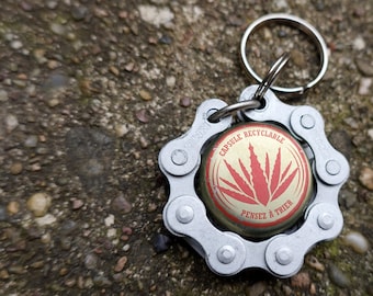 Key chain made from upcycled bicycle chain and a beer cap Desperados tequila