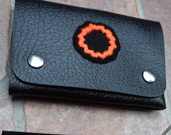 Minimalist vegan wallet with embroidery of a bike patch