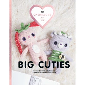 May include: A book titled "Chenillove Big Cuties" with a pink bunny and a purple bear on the cover. The book features crochet patterns for making plush toys.