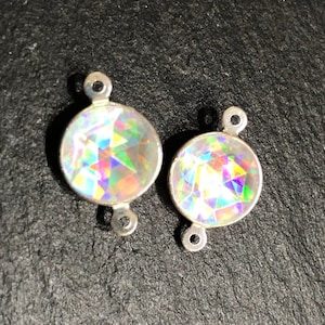 Sparkling jewelry pieces - as an intermediate part in a bracelet, necklace or earring - with 2 eyelets - rectangular or round - different colors - 2 pieces