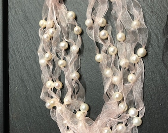 Necklaces and ribbons threaded with freshwater pearls - unusual and beautiful