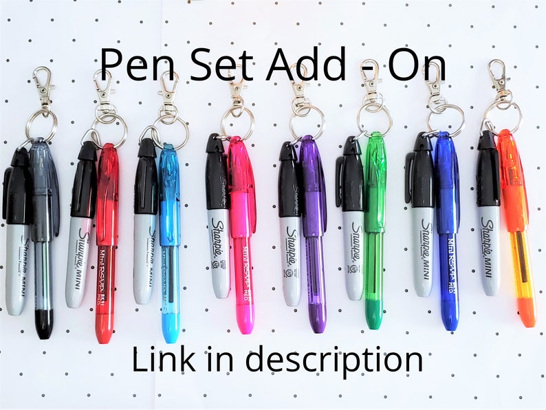May include: A set of ten Sharpie mini pens with keychains. The pens are in various colors, including black, red, blue, turquoise, pink, purple, green, and orange.