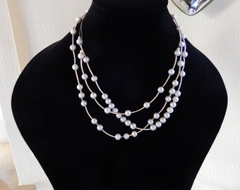 Three-row pearl dream in gray, 8 mm pearls and 925 silver bars. Unique gift jewelry to attract attention, handmade in Germany