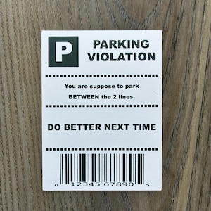 Parkeerovertredingskaart, slechte parkeerkaart, grappige parkeerkaart, nep-parkeerkaart, propparkeerkaart