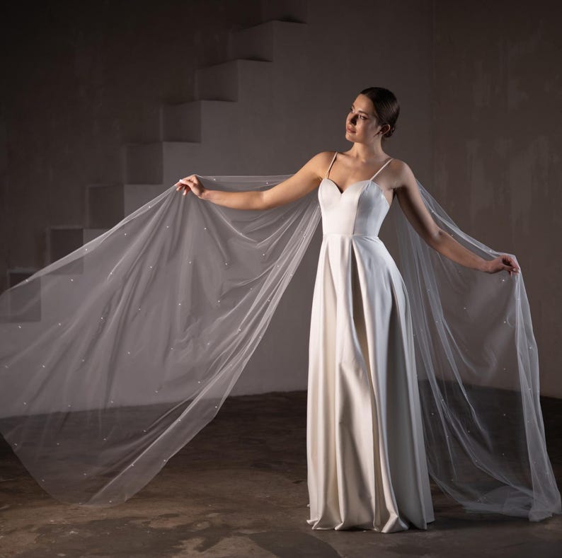 Two piece bridal shoulder wings made of illusion tulle for bride
