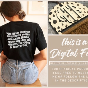May include: A black t-shirt with white text that reads "Dear person behind me, you are loved, worthy and always enough. I hope you have a good day! With love, the person in front of you."